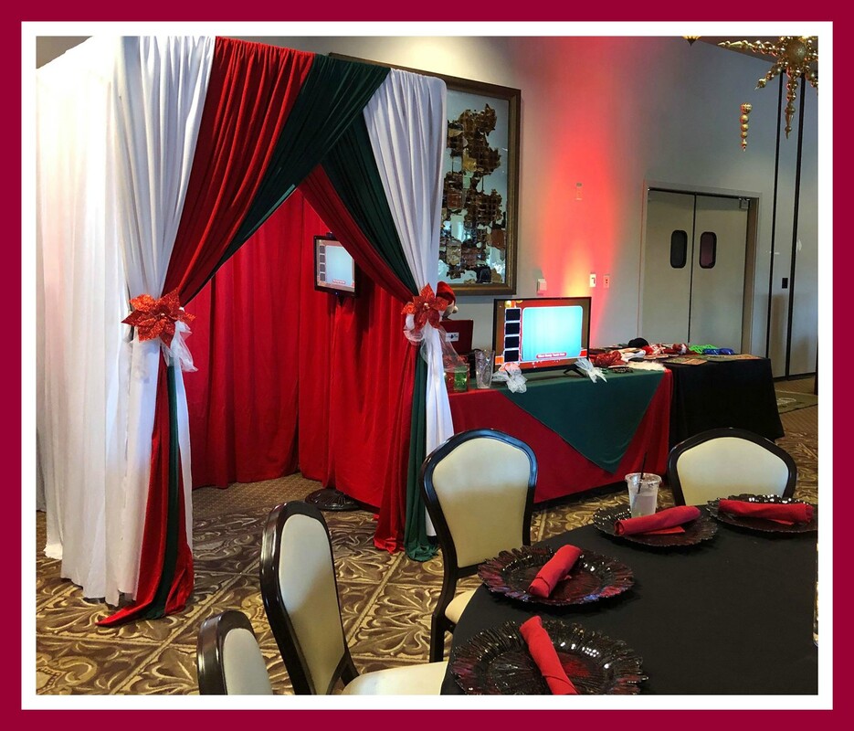Couple kissing in The Party Box photo booth
